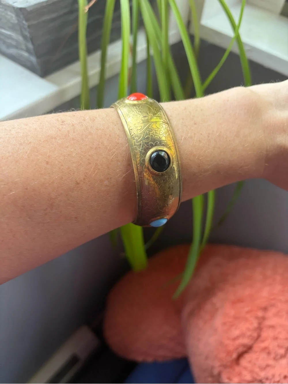 Vintage-Inspired Brass Bangle with Red, black, and Turquoise Cabochons
